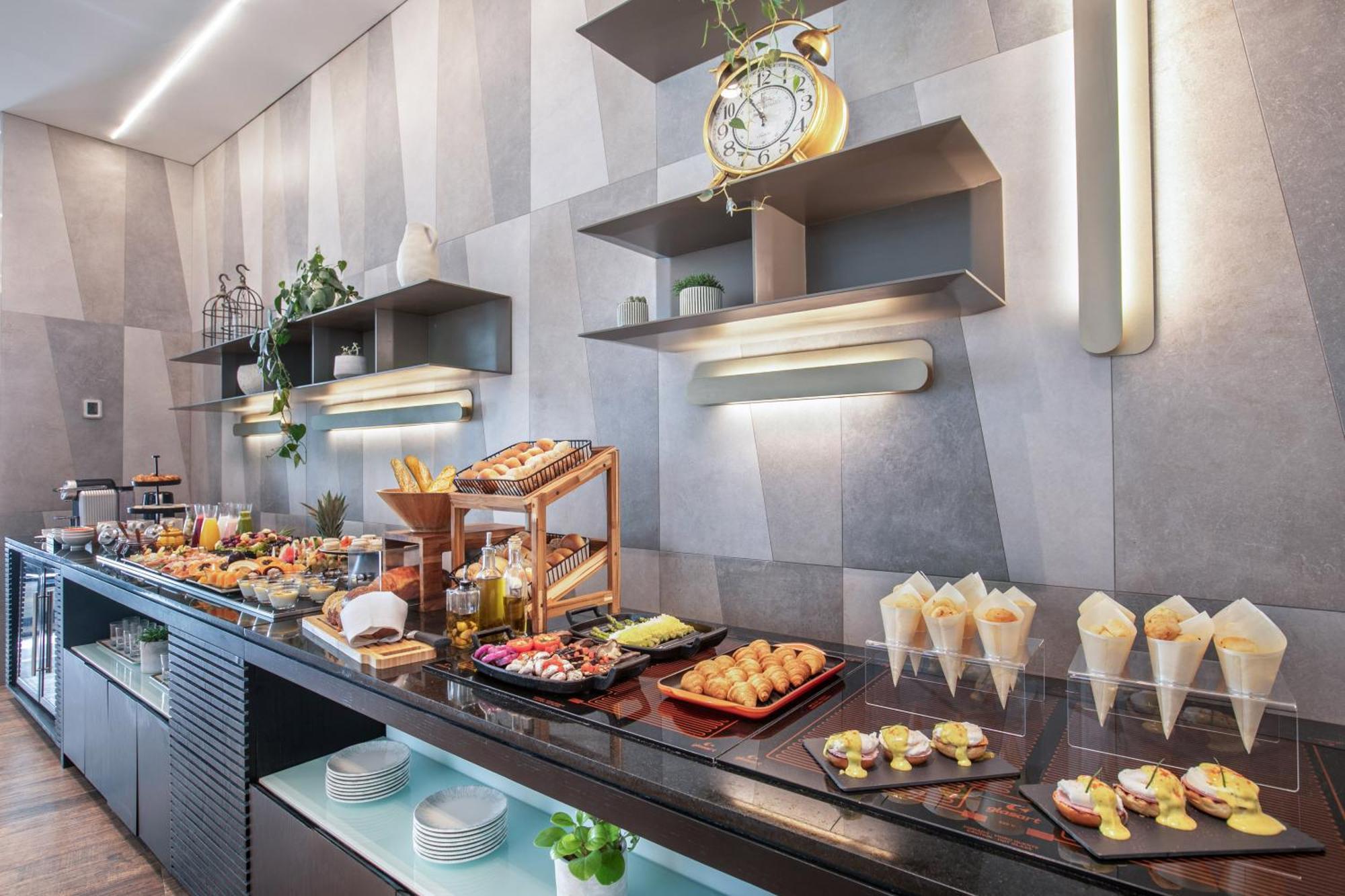 מלון סאו פאולו Melia Jardim Europa מראה חיצוני תמונה A buffet at a hotel
